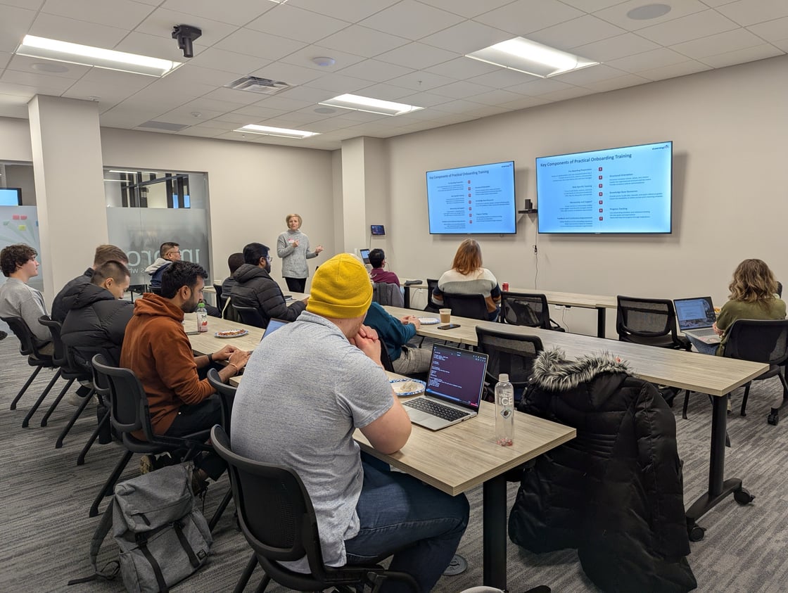 Group of software engineers watching a presentation